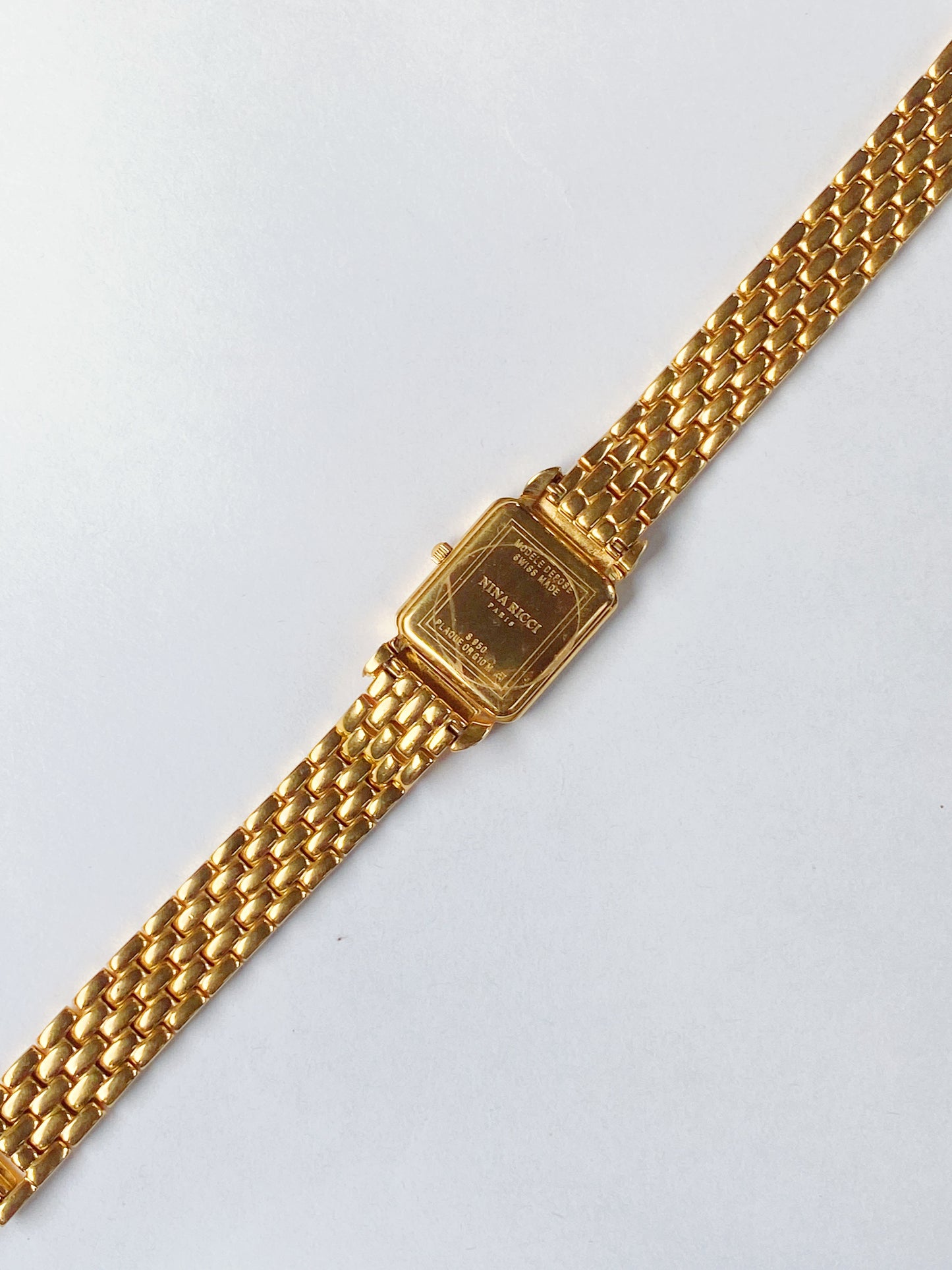 Rare vintage Nina Ricci Watch – Gold Plated Bracelet, Mother of Pearl Dial, Bow Detail, Parisian Elegance