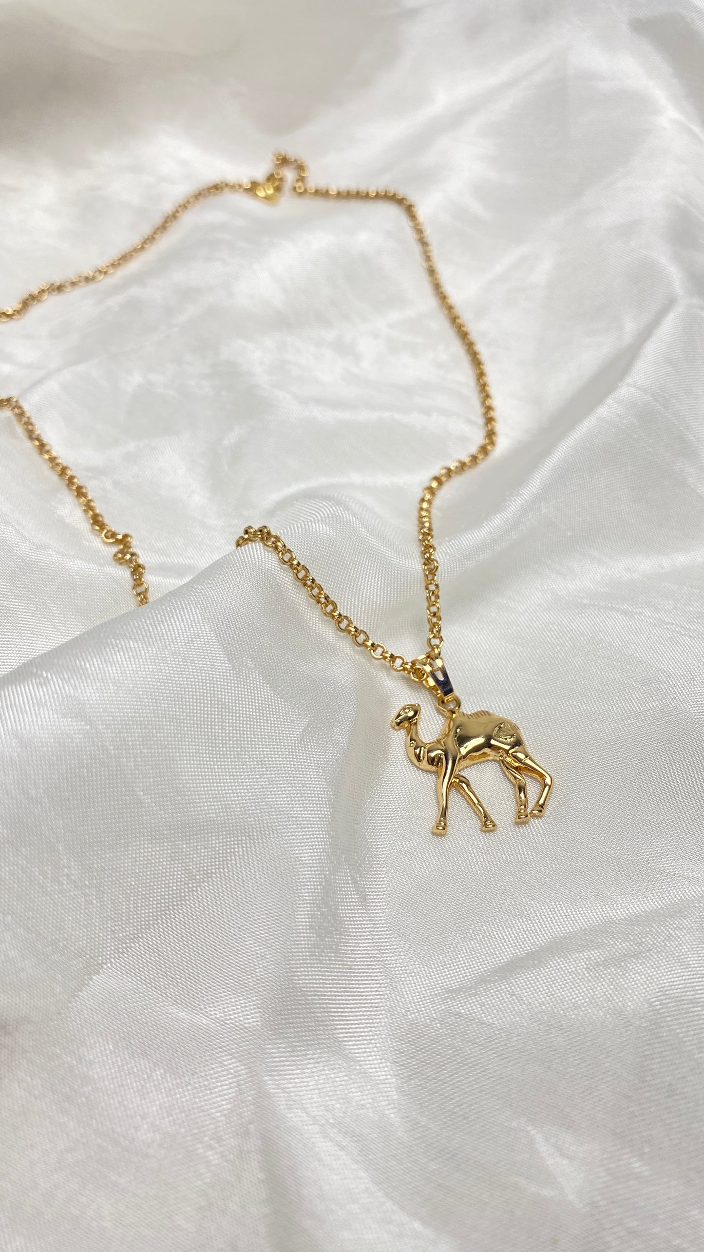 Gold plated camel necklace