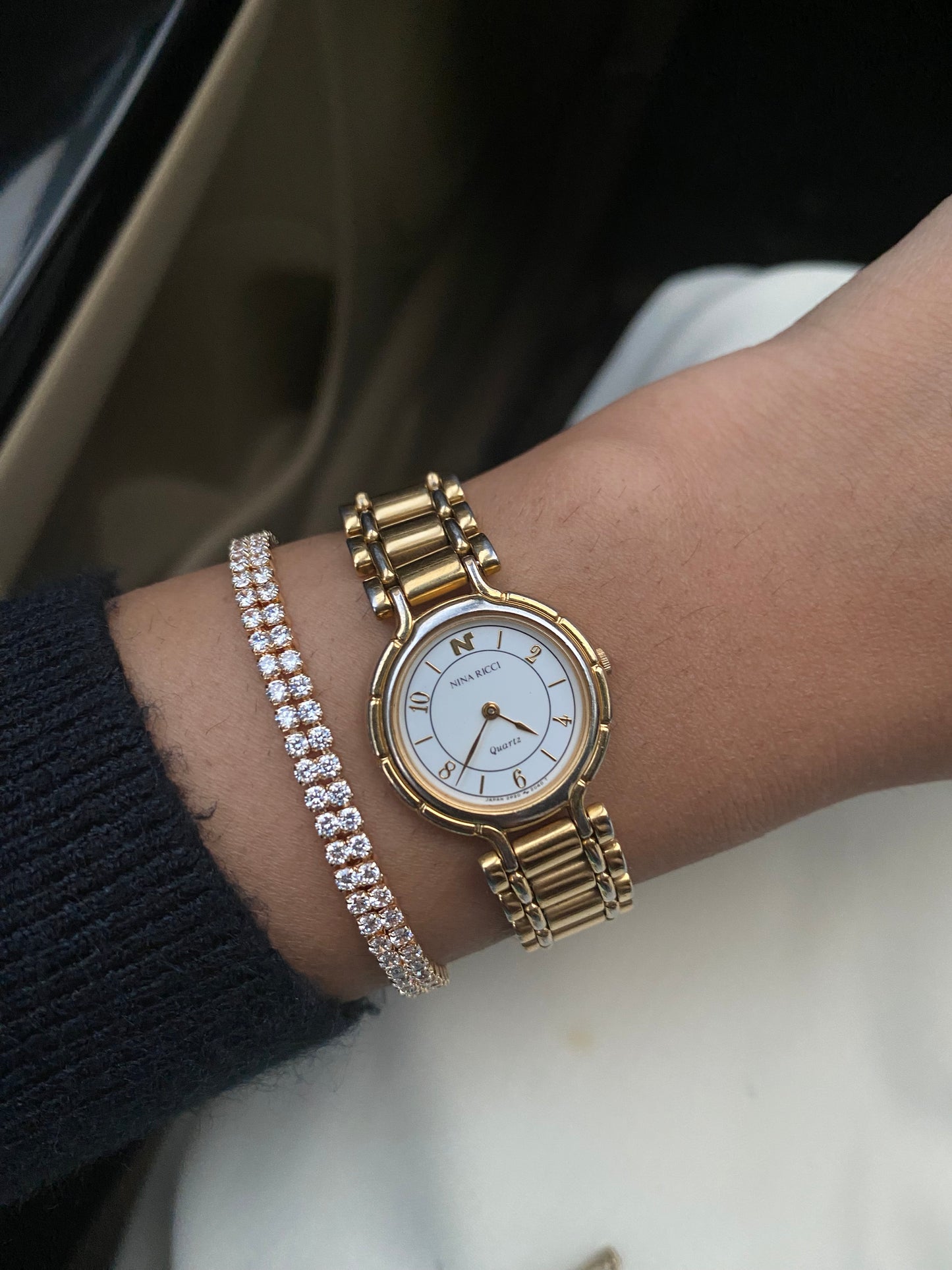 Nina Ricci Gold Tone Watch