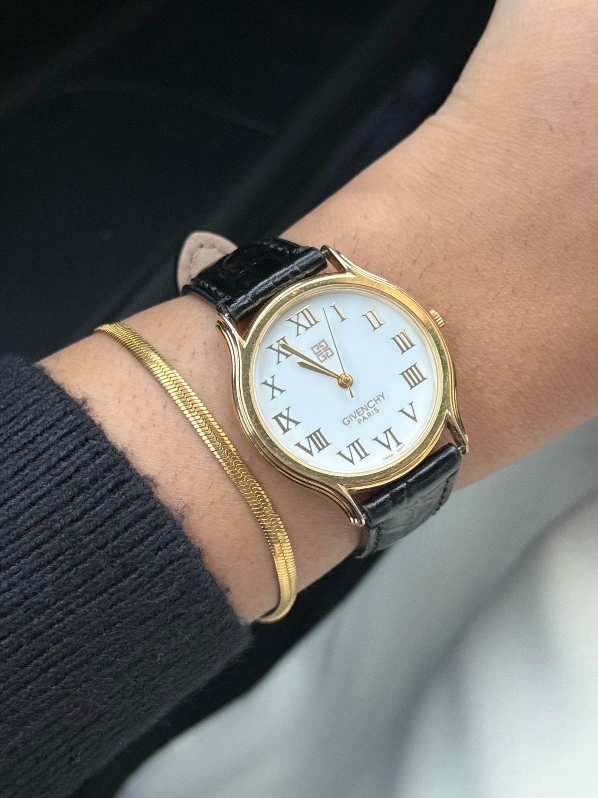 Vintage Givenchy Roman white dial & Leather strap watch; Swiss timepiece