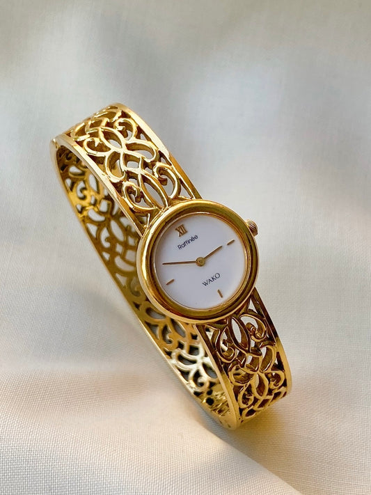 Raffinee Rare bangle watch in gold tone