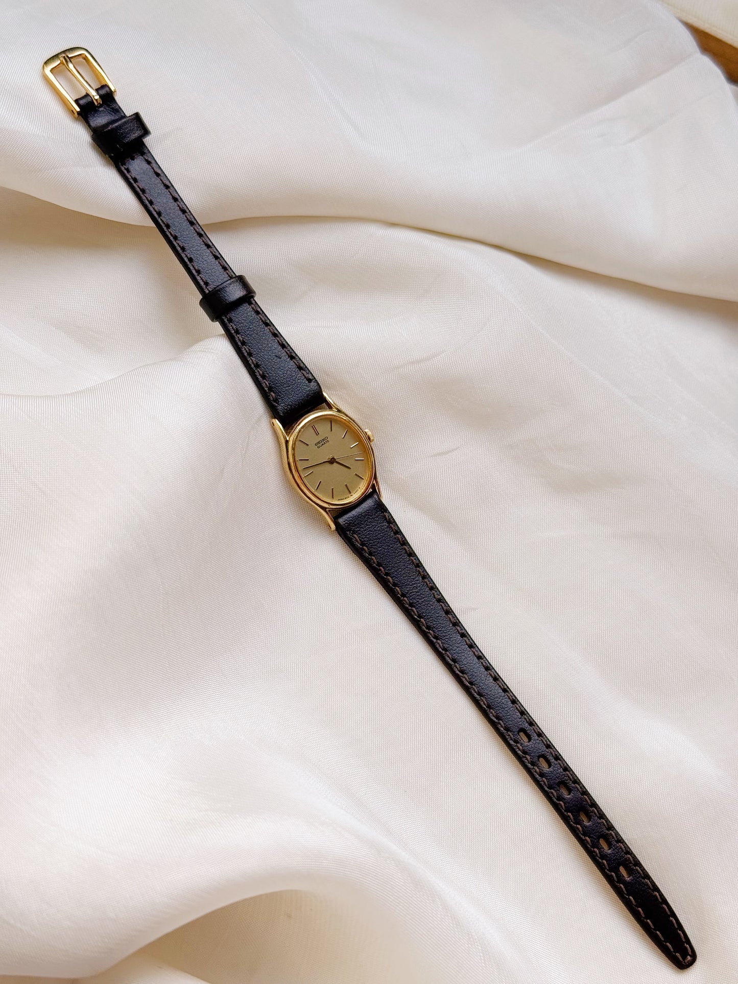 Seiko Oval dial leather strap watch