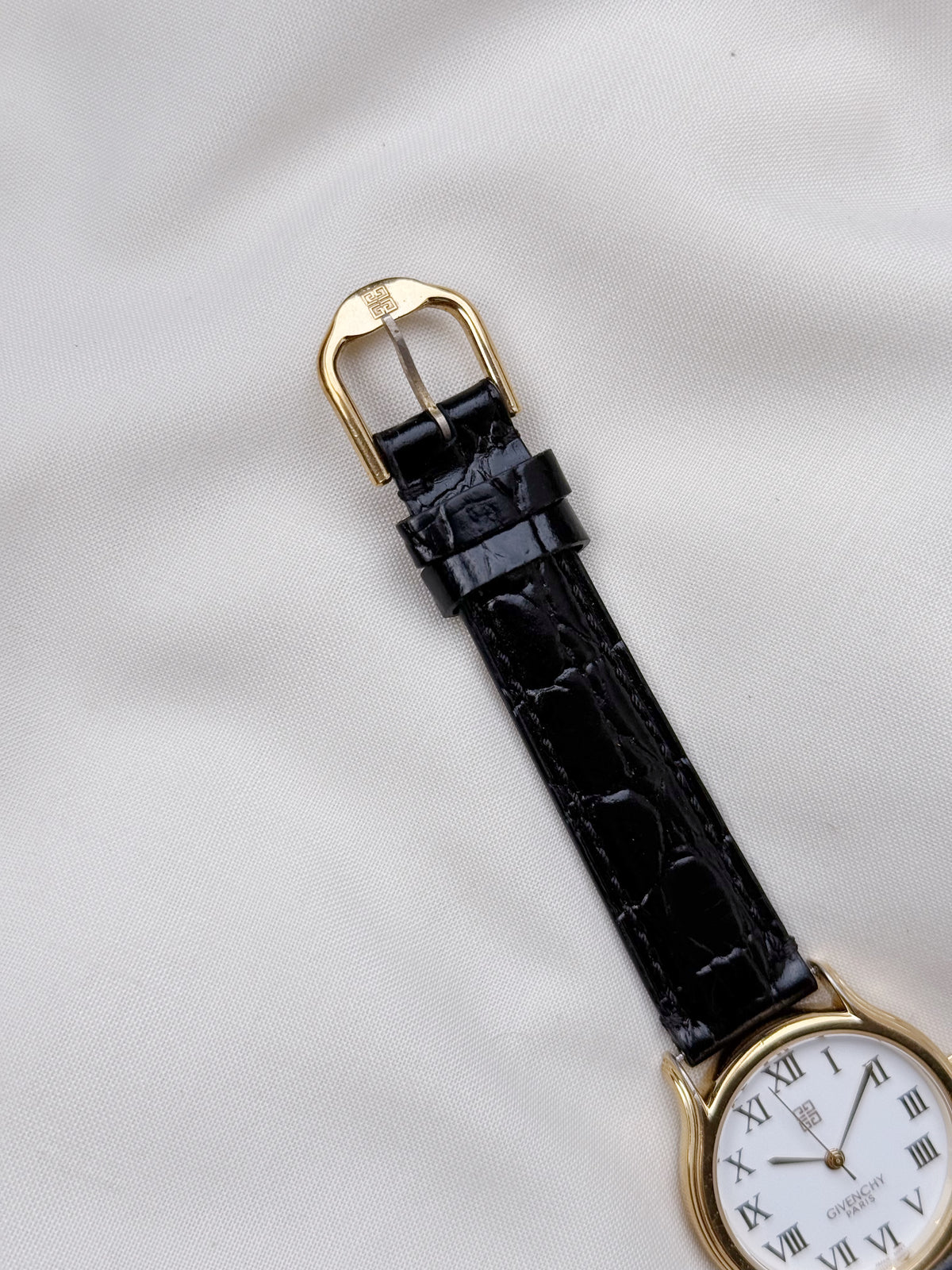 Vintage Givenchy Roman white dial & Leather strap watch; Swiss timepiece