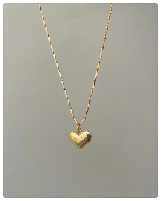Swoop heart necklace