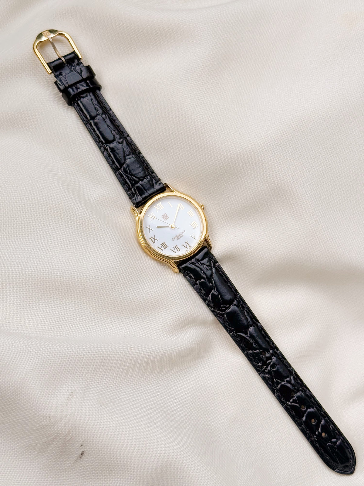 Vintage Givenchy Roman white dial & Leather strap watch; Swiss timepiece