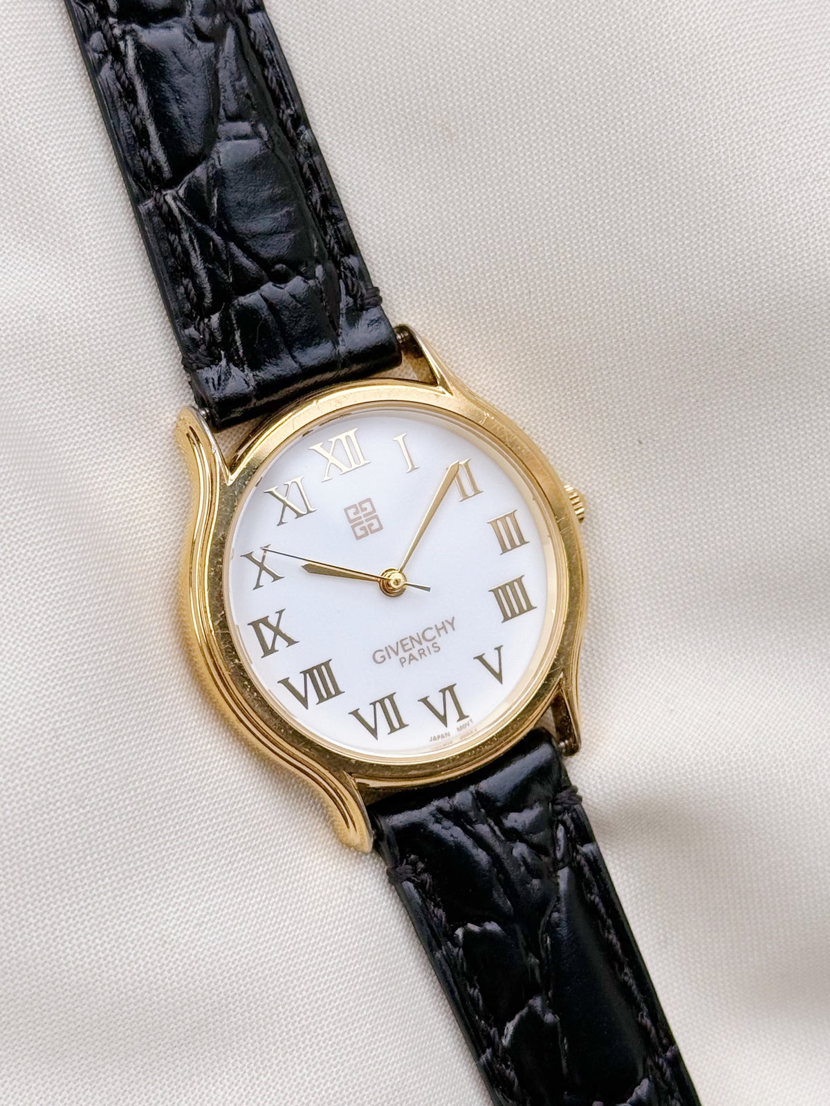 Vintage Givenchy Roman white dial & Leather strap watch; Swiss timepiece