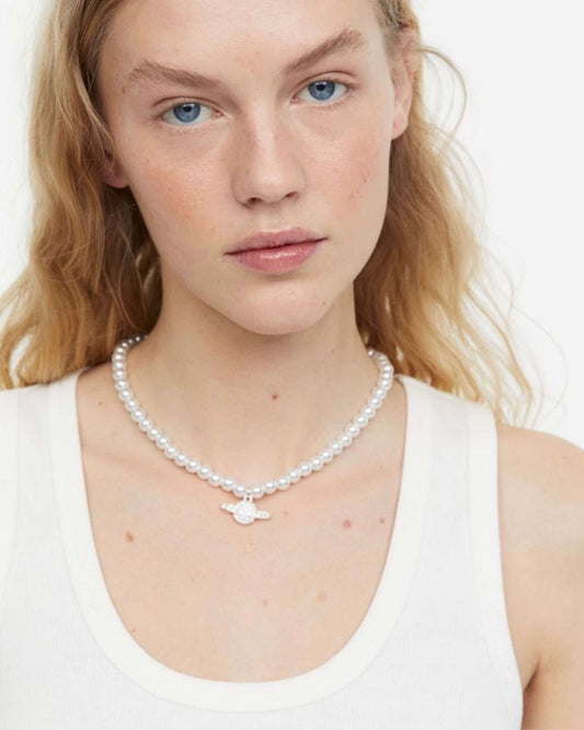 H&M planet rhinestone and pearl necklace