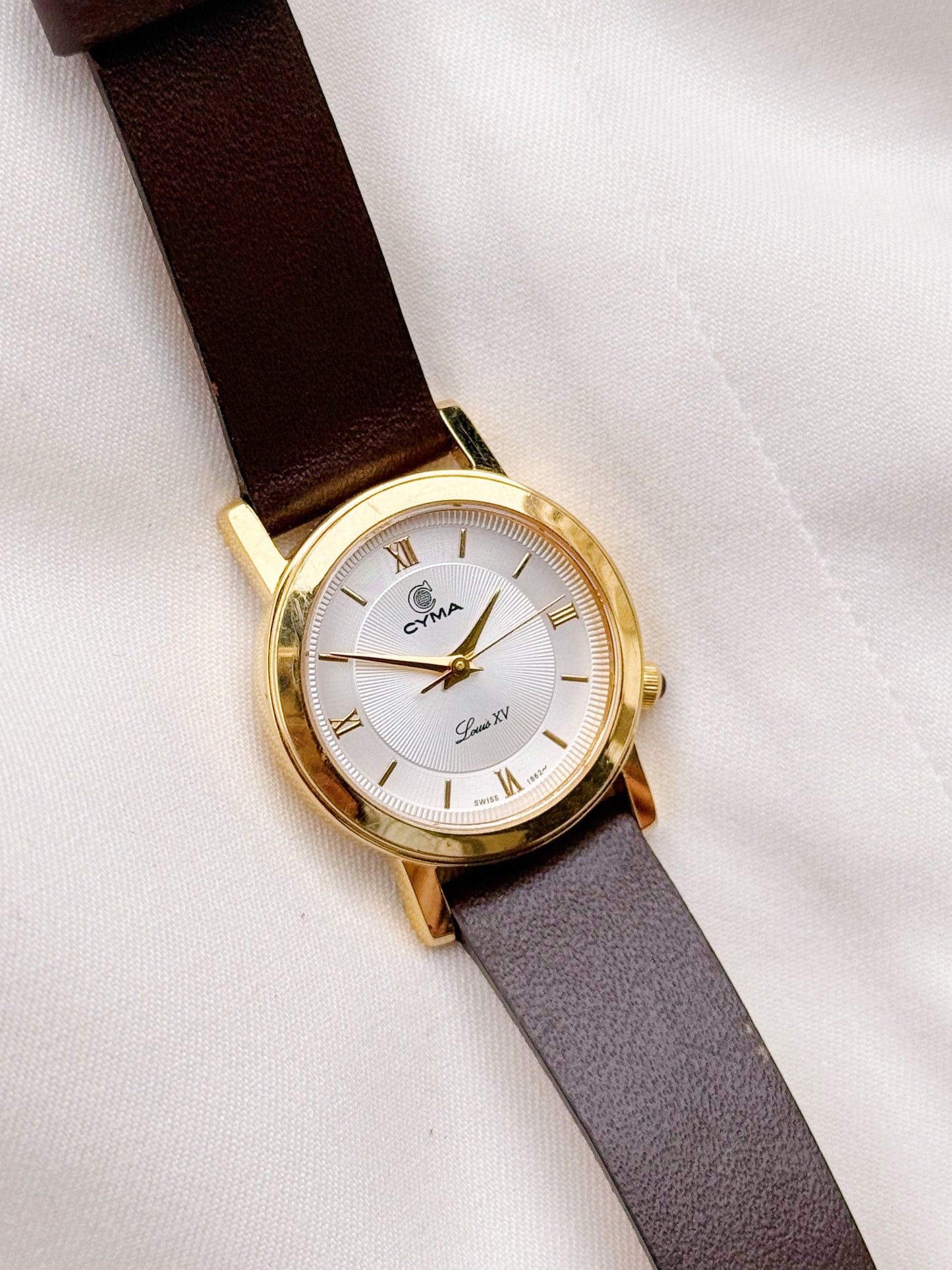Vintage Cyma Swiss made leather strap watch