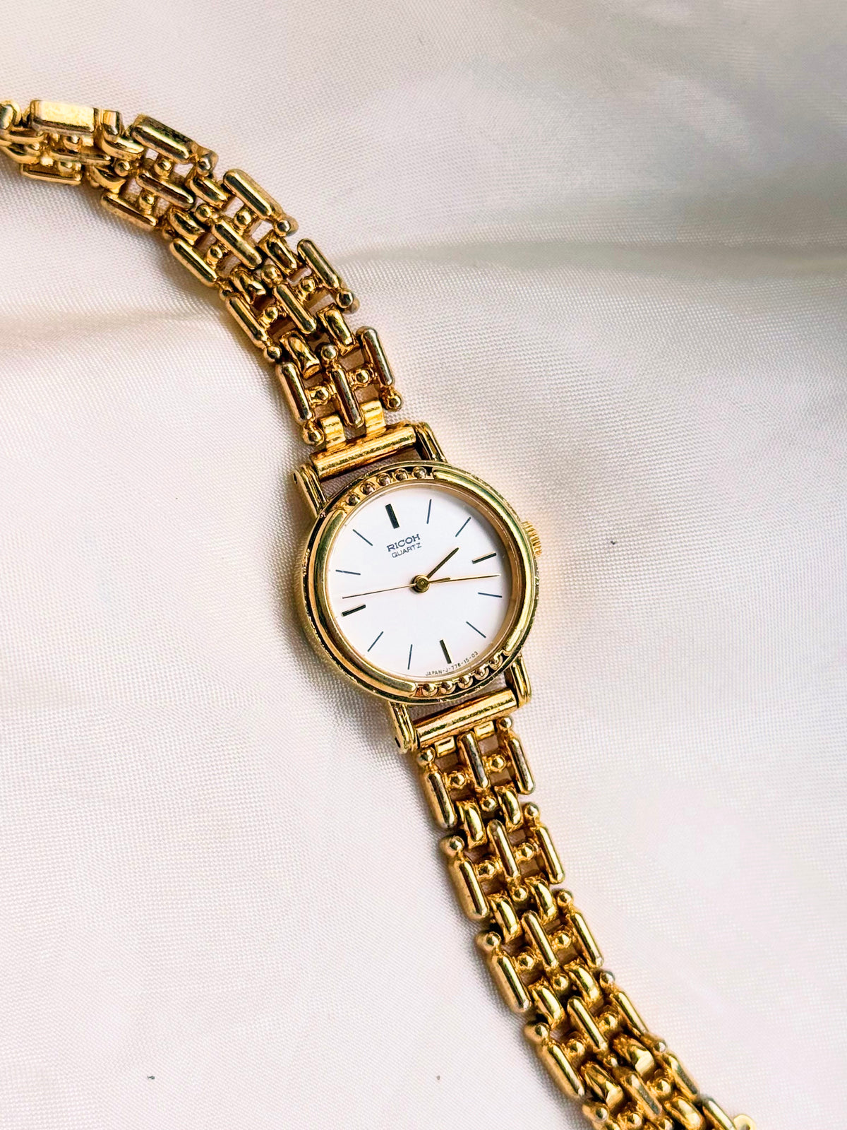 Citizen Ricoh Gold watch