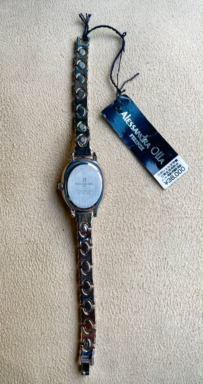 vintage Alessandra Olla Firenze silver-tone cameo "peek-a-boo" bracelet watch