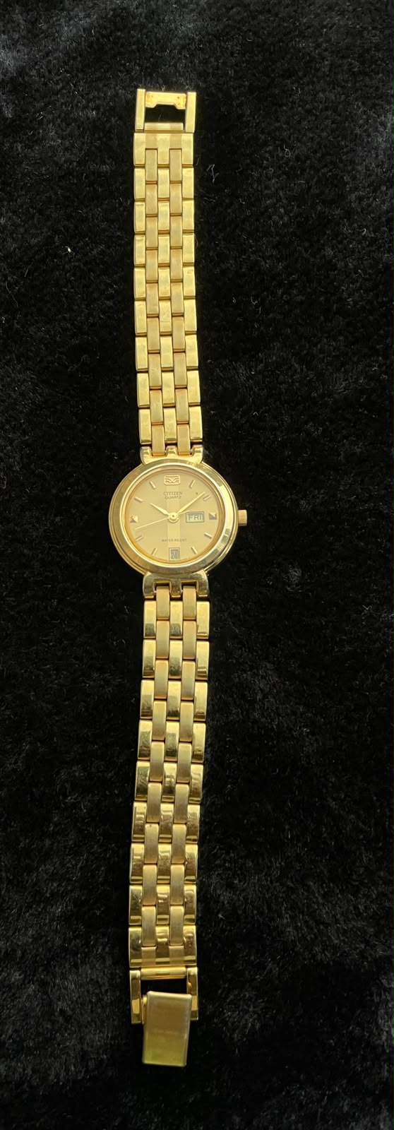 Vintage Citizen gold-tone watch with a day-date display women’s quartz watch
