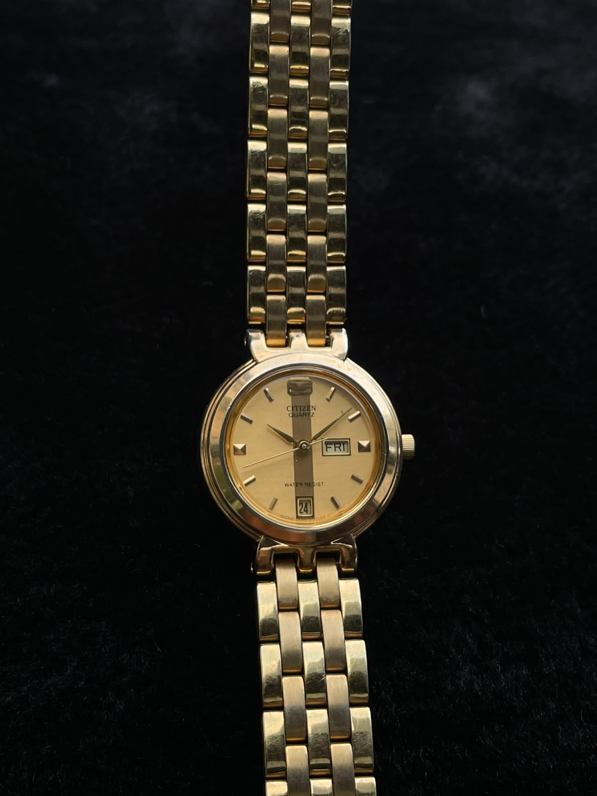 Vintage Citizen gold-tone watch with a day-date display women’s quartz watch
